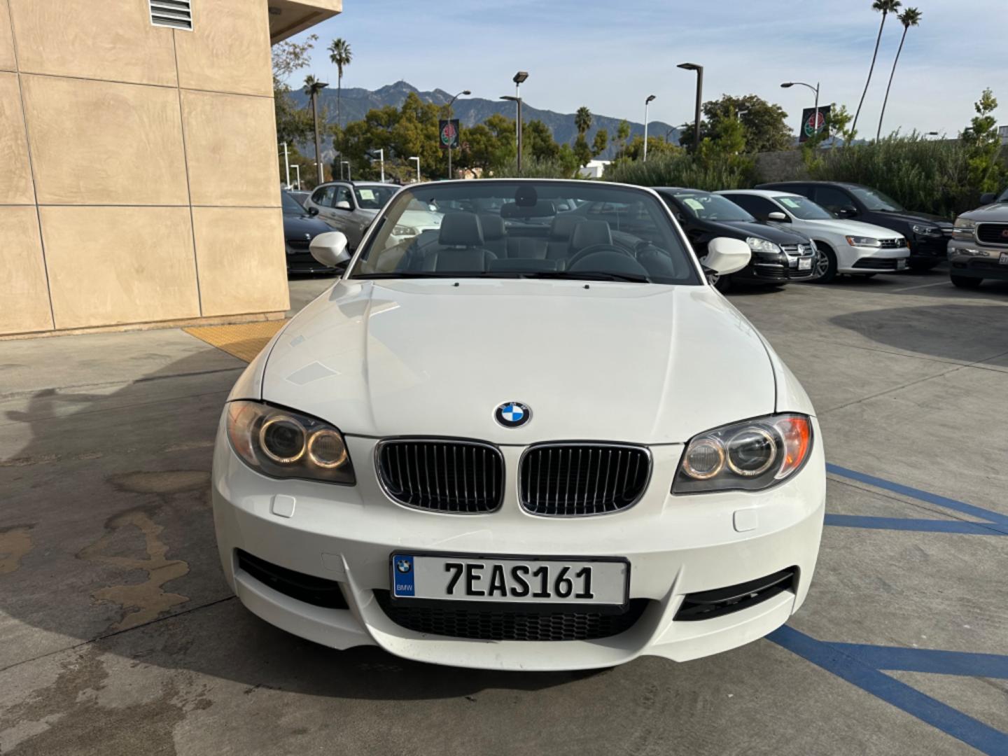 2011 WHITE /Black BMW 1-Series 135i Convertible (WBAUN7C56BV) with an 3.0L L6 DOHC 24V engine, Automatic transmission, located at 30 S. Berkeley Avenue, Pasadena, CA, 91107, (626) 248-7567, 34.145447, -118.109398 - Experience the Ultimate Driving Pleasure: 2011 BMW 135i Convertible Now Available in Pasadena, CA Discover the thrill of open-air driving with the 2011 BMW 135i Convertible, a perfect blend of luxury and performance, now featured at our BHPH dealership in Pasadena, CA. This exquisite convertible - Photo#17